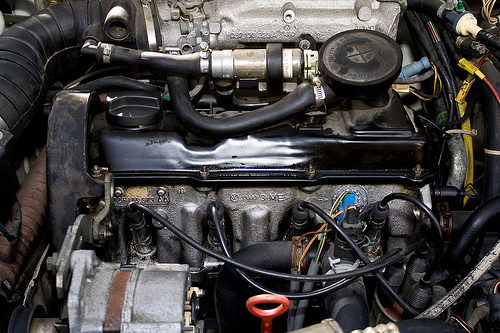 Some what cleaner engine bay after oil leaked each where